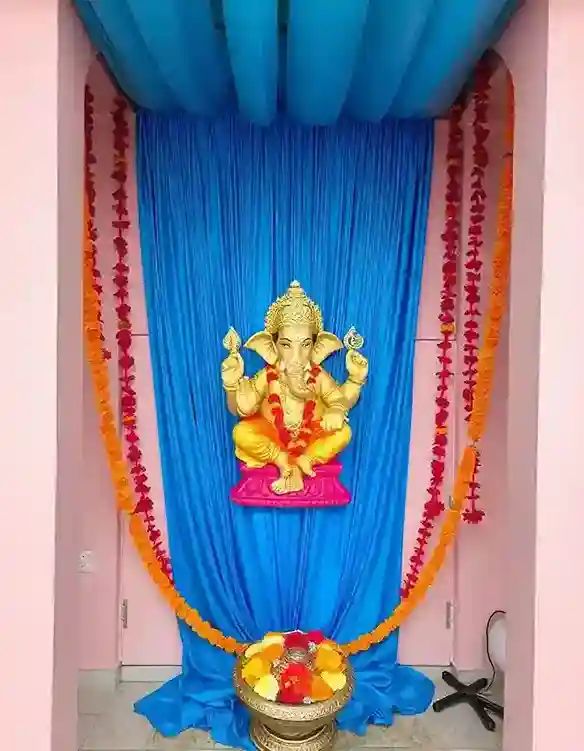 Simple Ganpati flower decoration with blue backdrop and marigold garlands | Simple and Elegant Ganpati Decoration with Flowers | Ganesh Chaturthi Decorations | Decorations Guru